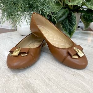 MICHAEL Michael Kors Brown Flats with Gold Accents